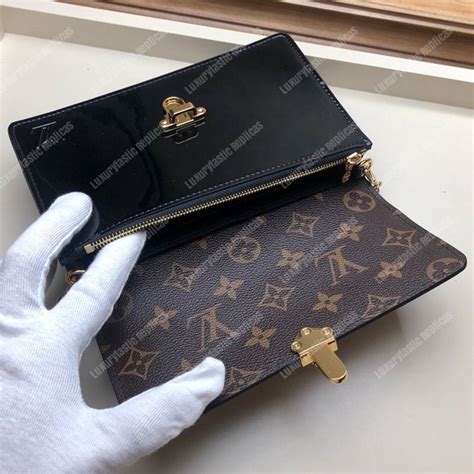 Louis Vuitton cherrywood chain wallet